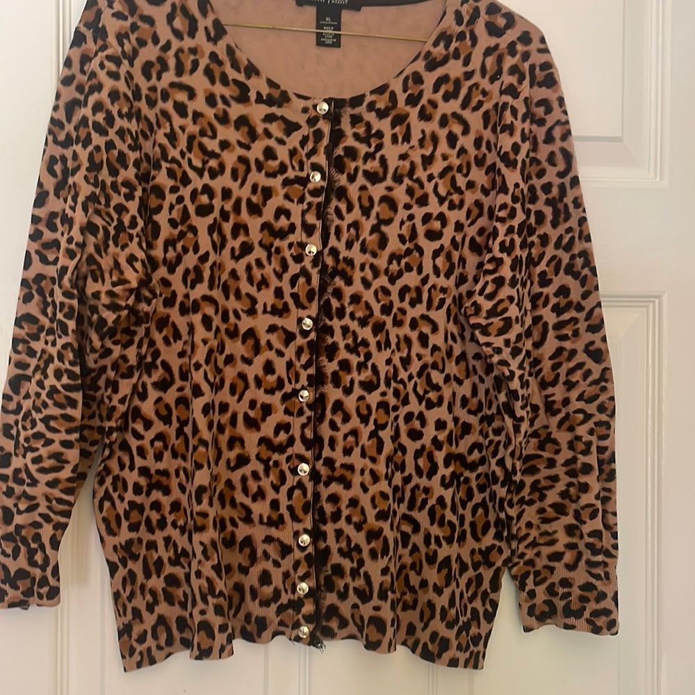 Leopard cardigan with gold buttons and black lace.